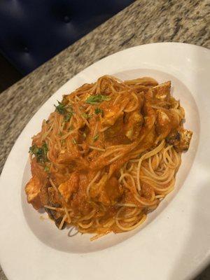 Spaghetti with vodka sauce and grilled chicken