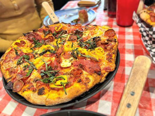 Spicy Italian- Tomato Sauce/Aged Mozz/ Fresh Mozz/ Pepperoni/Salami/ Italian Sausage/Red Onion/Banana Pepper/Garlic/ Chili Flake/Basil/ Parm