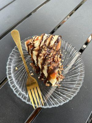 Slice of turtle cheesecake. $6.00