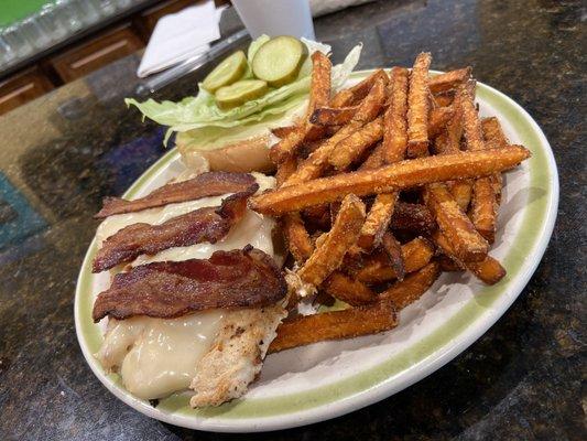 Grilled chicken sandwich with bacon and local sweet potato fries!