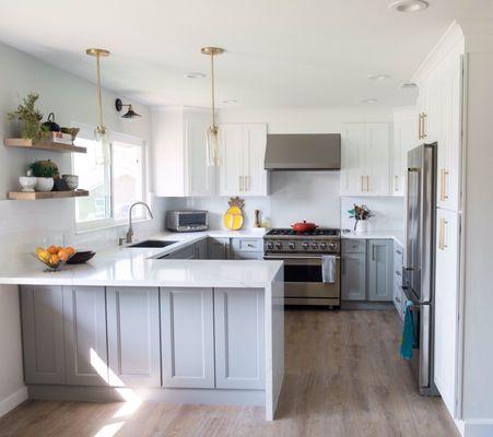 Overall kitchen design. The backsplash ties in very well with the design!