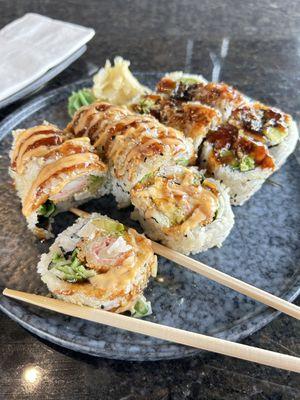 2x big piece of sushi! Left: crab crunch roll (cooked), right: salmon skin roll (cooked)