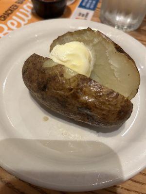 Smallest baked potato at a restaurant ... just butter