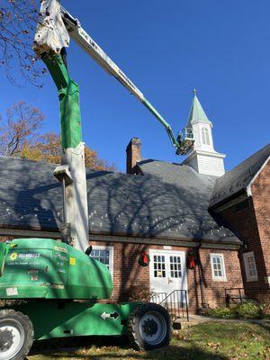 Painting the steeples for our friends at Trinity Church located in Arlington. We also painted their interior hallways and classrooms.