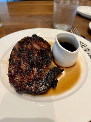 Ribeye steak with red wine reduction sauce