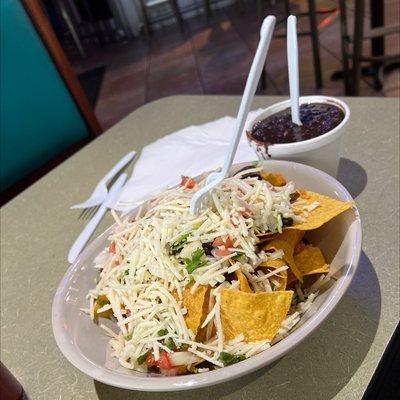 YUM! Vegan Nachos Supreme and a side of black beans. SO GOOD!