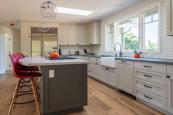 As part of this major remodel/addition, we completely updated this kitchen, adding an island, new cabinets, fixtures, and appliances.