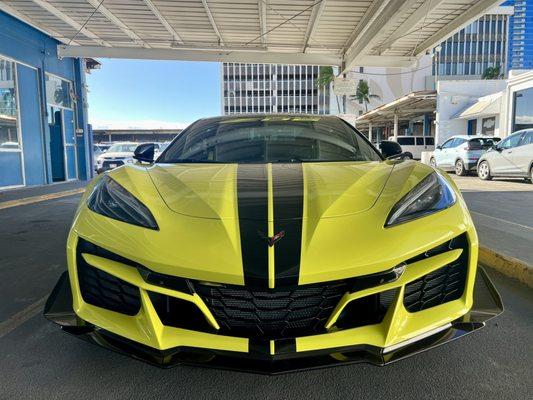 2023 Corvette Z06 front bumper fascia custom painted and colored matched Accelerate Yellow and cut to Carbon Flash Black