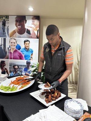 Ray at the Member Social - wings for May!