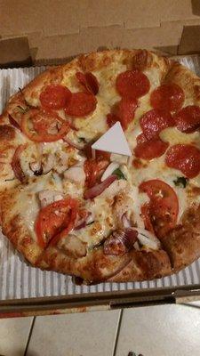 Half pepperoni,  half chicken florentine ( parmesan garlic sauce,  chicken, tomatoes, spinach and purple onions )....Delicious!