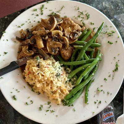 Veal marsala with green beans and risotto