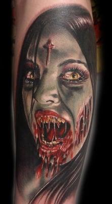 Demon girl tattoo by traveling pro artist Dan Henk