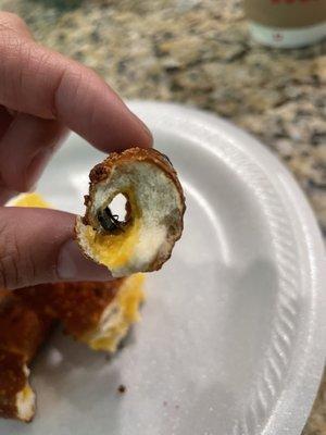 Warm pretzel with cheese