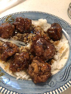 Orange chicken. Extremely dry, and burned. Fried too long.