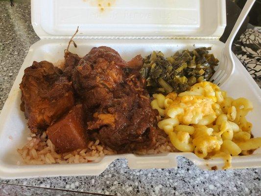 Brownstew chicken, mac and cheese, greens