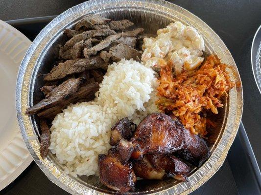 Pulehu Steak, Teriyaki Steak, Mochiko Chicken, kimchi slaw, Mac salad, and two scoops of rice!