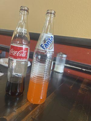 Medio litro coke and fanta orange