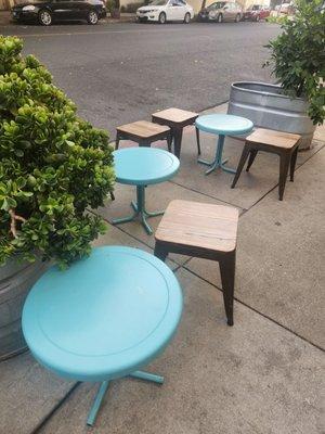 Cute little outdoor tables and stools