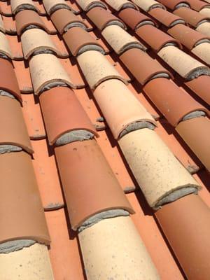 Custom clay tile re-roof and repairs.