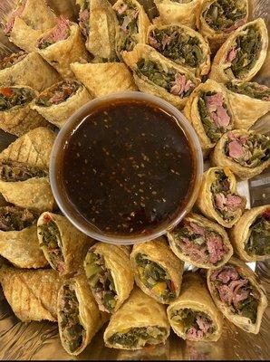 Susie's Soul Rolls seasoned Collards and Smoked Turkey in a Eggroll