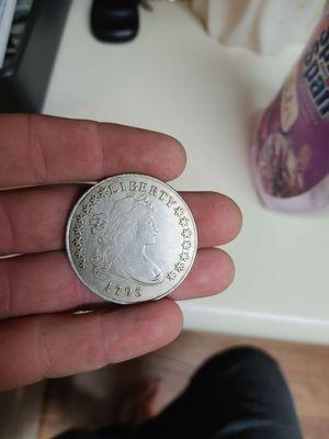 I have a 1795 Flowing Hair Silver Dollar what's the prices on this?