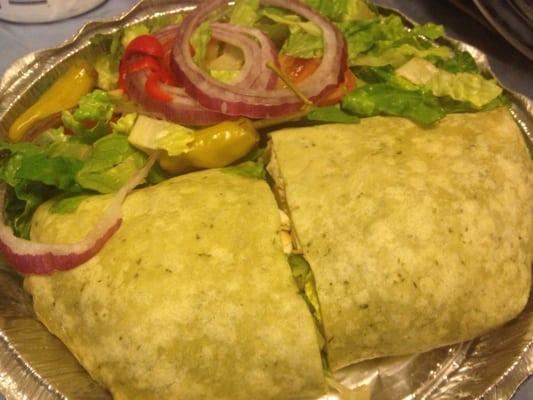 Grilled chicken, mozz, and roasted red peppers in a spinach wrap w a side salad (lettuce, tomato, onions, and hot peppers) 7.99