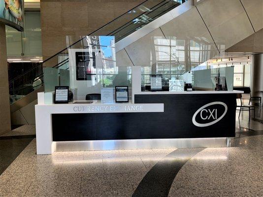 The CXI booth is now located on level 1, near Nordstrom beside the escalators.