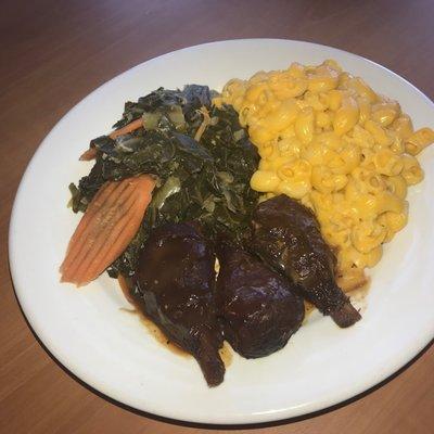 Southern Comfort: 3-piece BBQ Chikken, Bakon-braised Greens, with Mac & Cheeze.