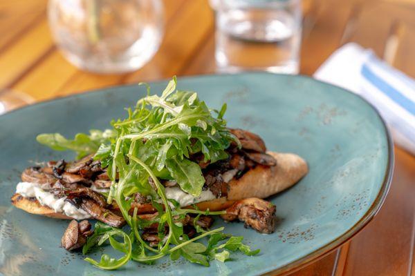 Wild Mushroom Toast - Grilled Sourdough, Whipped Truffle Ricotta, Arugula