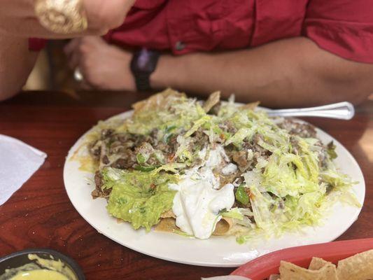 Fajita nachos with added shredded lettuce