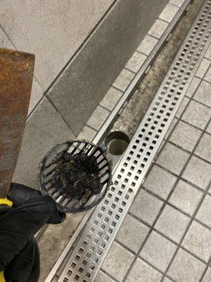 Cleaning of the shower drain in The Truck Stop