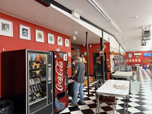 Vending machines on the left, from the front door.