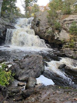 The heavy rushing water after many days of rain. This is the main waterfall. 10/2023