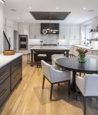 We love this transitional kitchen featuring furniture details on the island.