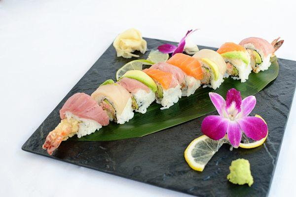 Black Tiger Rainbow Roll - Black tiger shrimp tempura, snow crab and avocado wrapped with tuna, salmon and yellowtail