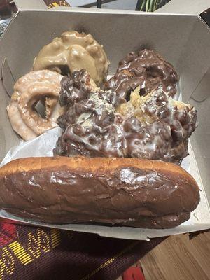 The oversized eclair with the huge apple fritter behind it. There's a huge piece missing because, well, it was good!