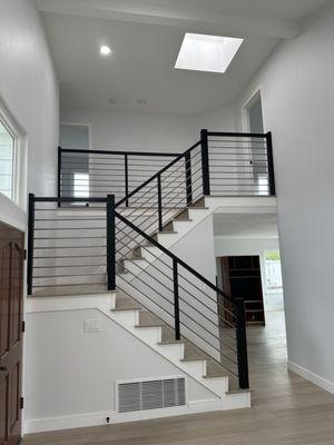 Stairs remodeling, hardwood flooring on stairs and flooring, wood handrail with metal cable