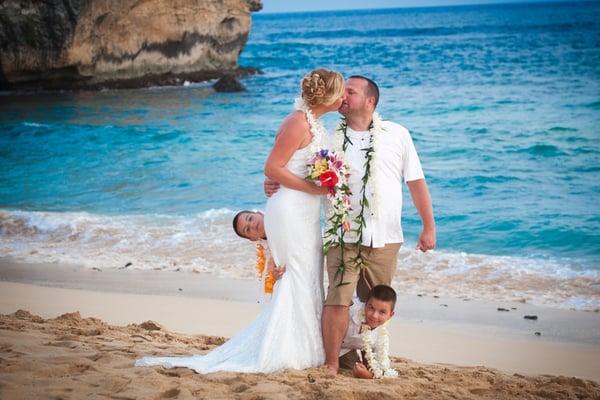 Beautiful family married on Kauai at Shipwreck Beach