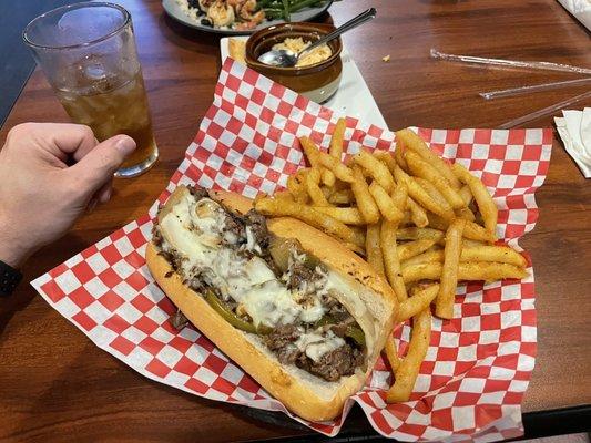 Philly cheesesteak and fries