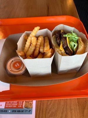 Double cheeseburger and fries with Rick sauce