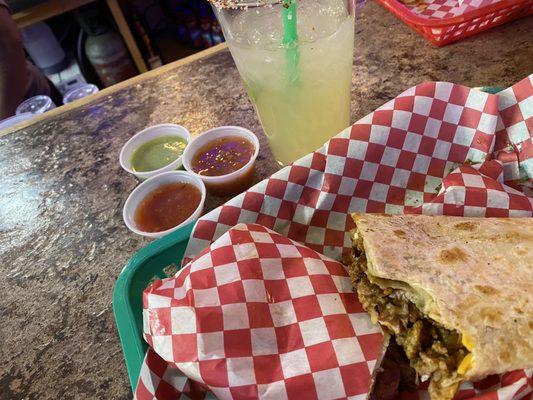 My burrito, and a few house made salsas, and my margarita. Sorry there is a bite gone, it looked and smelled SO good, I had to take a bite.