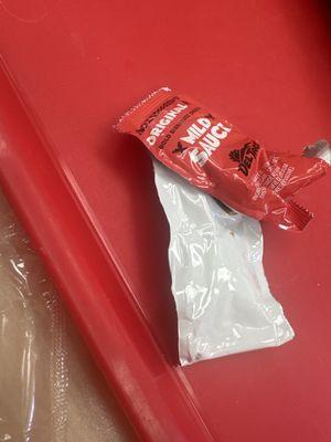 The salsa packet are stuck together