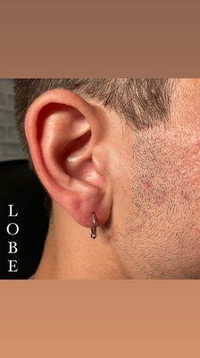 Lobe piercing.