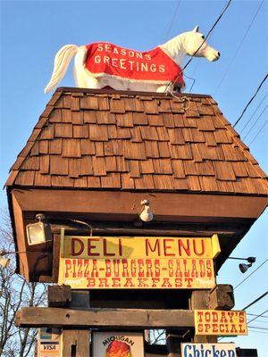 27 November, 2016 - The White Horse Saloon’s iconic statue wearing a festive holiday horse blanket.