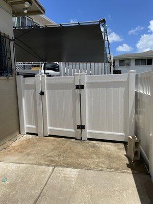 Privacy fence with swinging gate