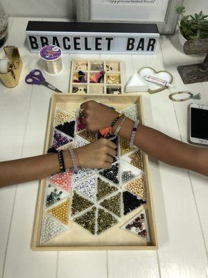 Made some friendship bracelets at the Bracelet Bar