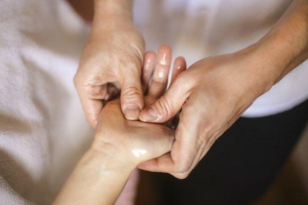 Acupressure on the hand to increase blood circulation and energy