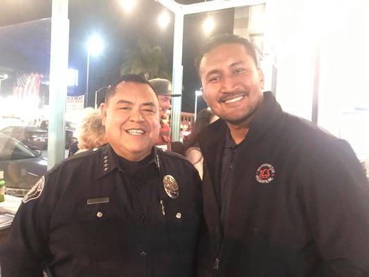 Peleti with the chief of Police of Los Alamitos Police Department.