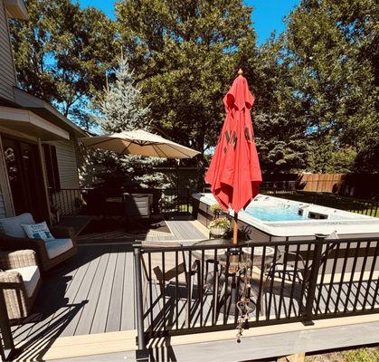 Another viewing angle of our entire deck.  The 3 step stairs go down to our stamped concrete patio.