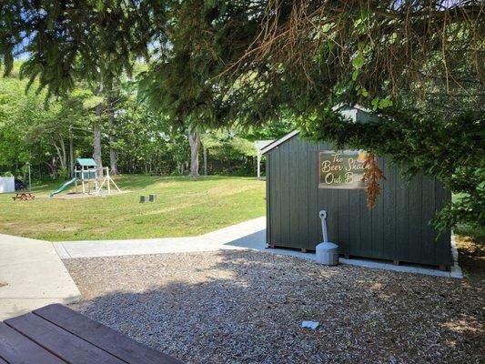 Back lawn, play area, beer shack